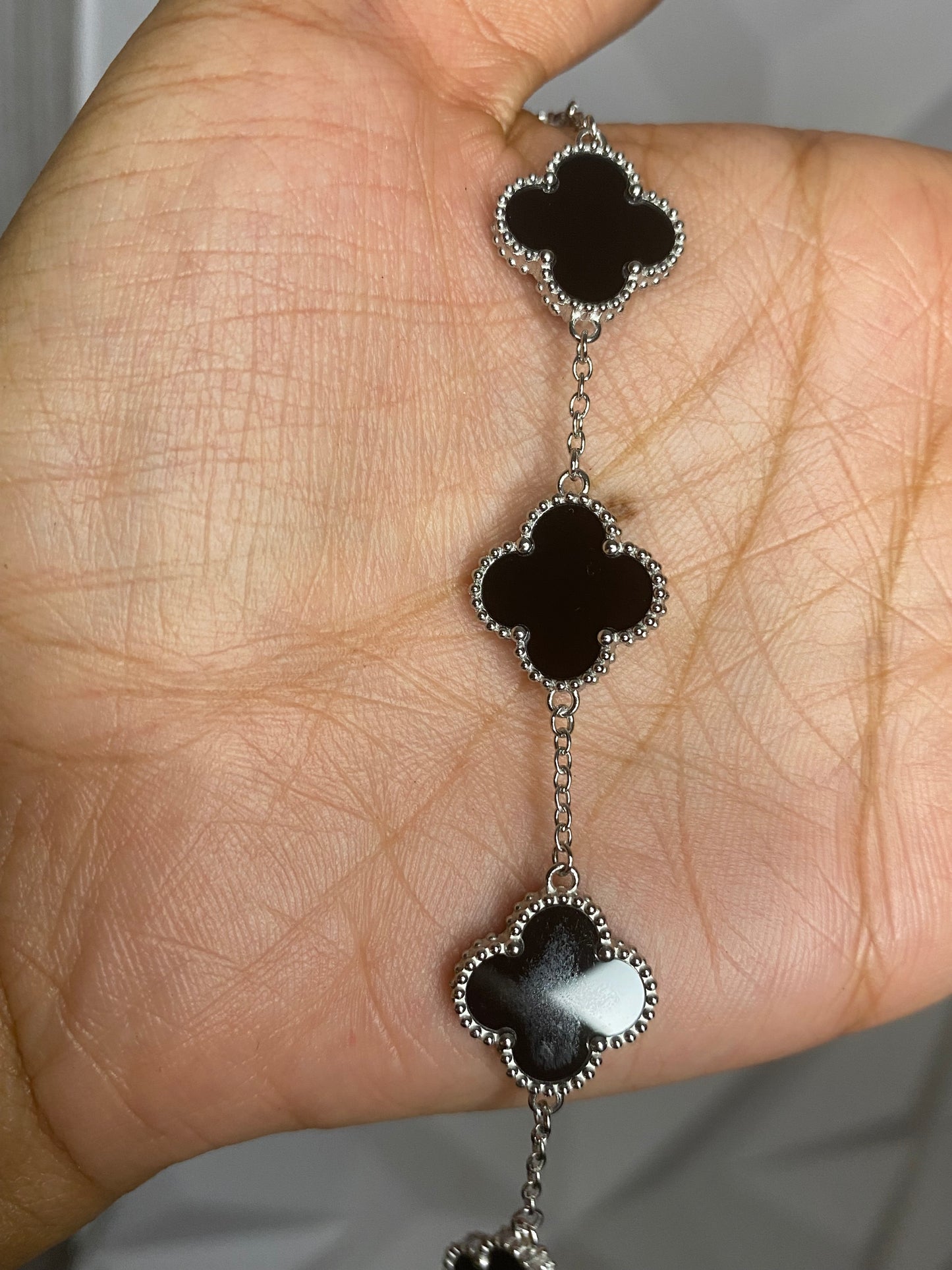 Black and silver clover bracelet